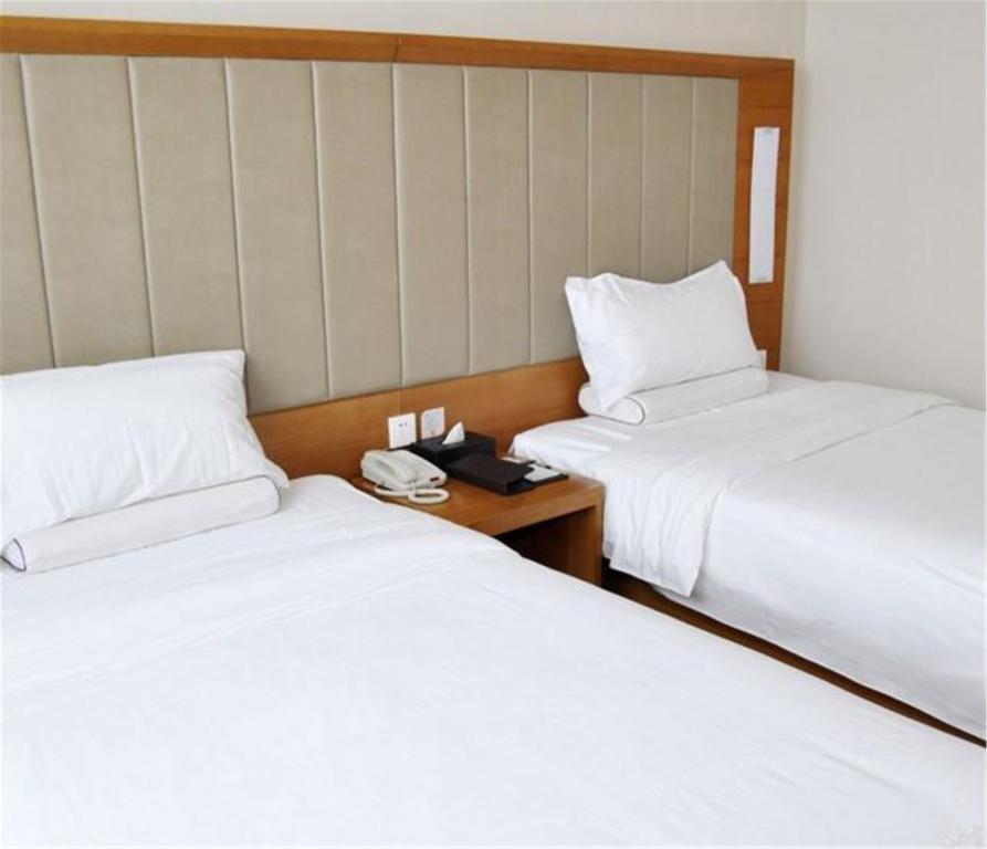 Ji Hotel Xianggang Middle Road Čching-tao Pokoj fotografie